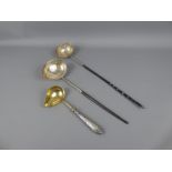 Three Antique Silver and Silver Plated Ladles, marks rubbed, two with turned handles one with silver