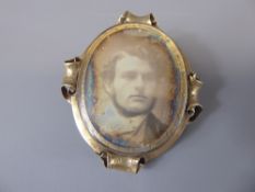 An Antique Yellow Gold Double Sided Photographic Brooch.