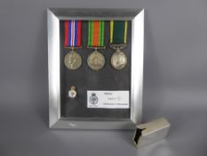 Group of WWII Medals, to 2038158 SSGT S. Wise REME, and an enamel veterans badge, mounted into a