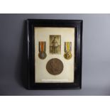 A Framed WWI Medal Group to Private Edward Savage and bronze death plaque reading "Private No.