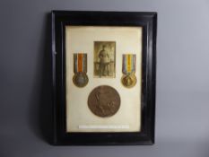 A Framed WWI Medal Group to Private Edward Savage and bronze death plaque reading "Private No.