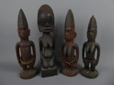 Four West African Ebony Carved Fertility Figures, all with elaborate headdress, approx 30 cms