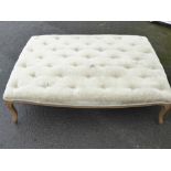 A Large OKA Footstool, approx 142 x 40 cms, grey/green velveteen upholstery.