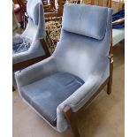 A Pair of Danish Designer Easy Chairs, upholstered in blue velvet fabric.