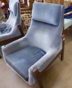 A Pair of Danish Designer Easy Chairs, upholstered in blue velvet fabric.