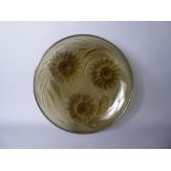 An Art Deco Style Verlys Smoky Quartz Bowl, moulded with sunflowers and leaf decoration, 27 cms d.