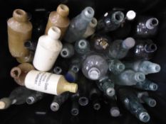 A Box of Miscellaneous Stone and Glass Bottles, approx 9 and 32 respectively.