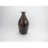 R. Higgs Studio Pottery, brown glazed pottery vase with incised decoration and knots in relief,