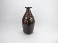 R. Higgs Studio Pottery, brown glazed pottery vase with incised decoration and knots in relief,