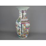 An Early 20th Century Chinese Famille Rose Vase, hand painted with scenes of The Chinese New Year