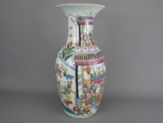 An Early 20th Century Chinese Famille Rose Vase, hand painted with scenes of The Chinese New Year