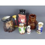 A Collection of Six Vintage Toby Jugs, the largest 24 cms and smallest 9 cms.