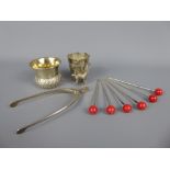 Miscellaneous Silver, including 'Wishbone' sugar nips, Argentinean silver beaker with applied