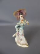 A Fine Vintage Porcelain Capo di Monte Figurine depicting a lady promenading, approx 17.5 cms.