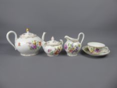 A Floral Dresden Part Tea Set, comprising tea pot, sugar bowl, milk jug, six saucers and one cup.