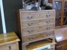 An Antique Chest of Drawers, with four drawers, slide to the top and brass swan-neck handles, approx