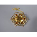 A 9ct Yellow Gold and Citrine Brooch, the centre stone measuring approx 17 x 12 mm and surrounded by