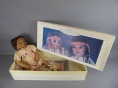 A Life Size Doll, Native American, in the original box.