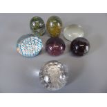 Miscellaneous Glass Paperweights, including a blue caned paperweight, faceted paperweight, Mdina