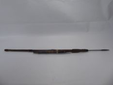 Two African Spears, one with metal decoration, approx 94 cms, the other with bound hide