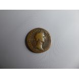 A First Century AD Roman Coin, depicting Nero Caesar Augustus right profile and a palm tree SC to