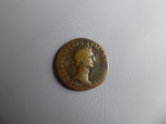 A First Century AD Roman Coin, depicting Nero Caesar Augustus right profile and a palm tree SC to