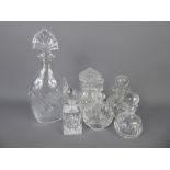 Miscellaneous Cut Glass, including a four scent bottles, a cotton wool jar and a water decanter. (