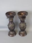 A Pair of 19th Century Bronze Vases, with raised dragon decoration, approx 30 cms.
