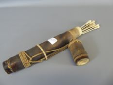 A Tribal Blow Pipe Quiver and Arrows.