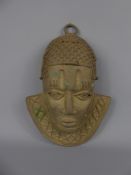 A West African Benin Cast Bronze Mask, with decorative collar and headdress, approx 32 cms