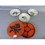 Three Chinese Ceramic Fish Plates, together with a red lacquer hors d' oeuvre tray and dishes.