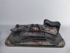 A Black Lacquered Japanese Writing Desk Set, comprising a writing tray, small pen tray, letter rack,