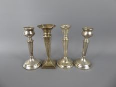 A Pair of Travelling Candlesticks, Birmingham hallmark, dated 1924, mm W, together with two