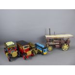 A Collection of Six Vintage Toys, including a metal steam-wheel, steam engine and trolleybus