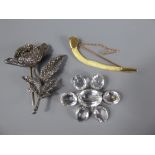 A Silver and Marcasite Poppy Brooch approx 19.5 gms, mm, T.M. & Co., together with a silver and
