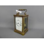 A French Brass Cased Carriage Clock, white enamel face with Roman dial stamped Byrne Paris, approx