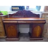 An Antique Mahogany Sideboard, three cutlery drawers with shield panel doors to beneath, galleried