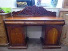 An Antique Mahogany Sideboard, three cutlery drawers with shield panel doors to beneath, galleried