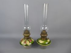 Two Faience-Style Glass-Bottomed Paraffin Lamps.