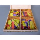 A Straw-Work Games Box, painted inside and inset with four straw compartments (filled with