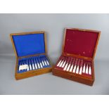 A Boxed Set of Twelve French Mother of Pearl and Silver Plated Fruit Knives and Forks, together with