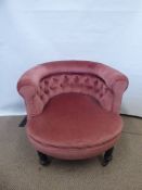 An Edwardian Tub Chair, in pink upholstery.