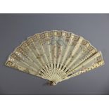 A 19th Century Delicate Wedding Fan, with bone guard sticks, decorated with mother of pearl.