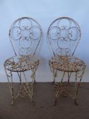 Two Antique Wrought Iron Garden Chairs with round seats, approx 88 x 36 cms dia. (seat)