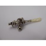 A Victorian Silver Rattle with mother of pearl handle.
