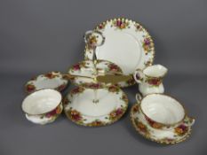 A Set of "Old Country Roses" Porcelain, comprising teapot, twelve tea cups, twelve saucers, milk
