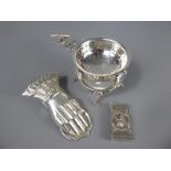 A Silver Metal Dutch Style Tea Strainer, the strainer on claw feet, together with a letter clip