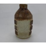 R. Higgs Studio Pottery Bottle Vase, with cream glaze and square decoration in relief, approx 20