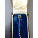A 9ct Gold Antique Diamond Stick Pin, old cut dia. approx 18 pts, approx 4.2 gms, contained within a