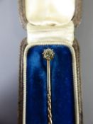 A 9ct Gold Antique Diamond Stick Pin, old cut dia. approx 18 pts, approx 4.2 gms, contained within a